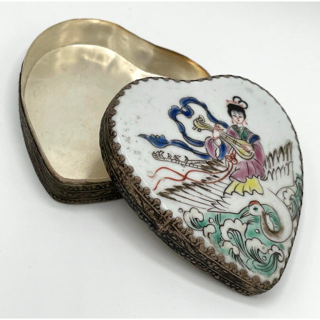 Crafted from fine porcelain, this trinket box showcases the quality and elegance often associated with Moriyama ceramics....