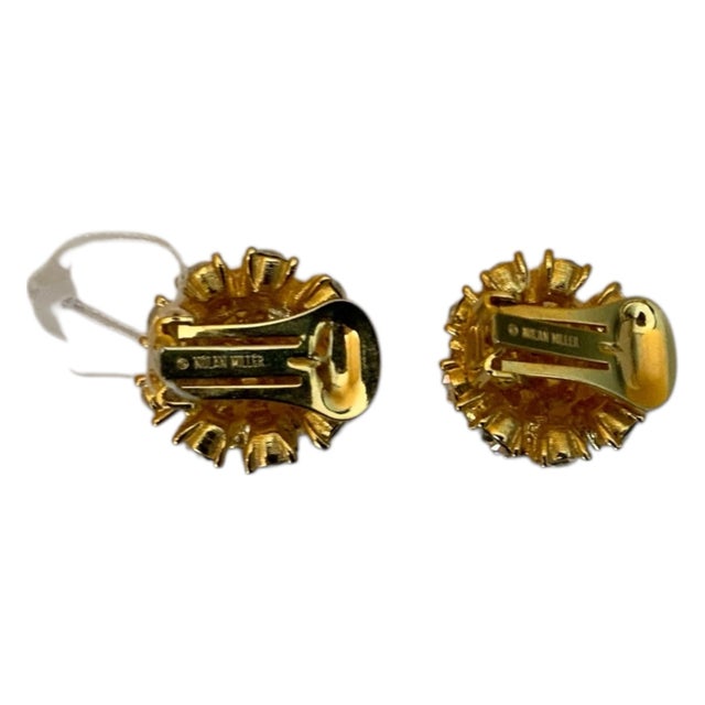These are a beautiful pair of designer Nolan Miller Clip On Earrings. These are gold tone and rhinestones. Please see...