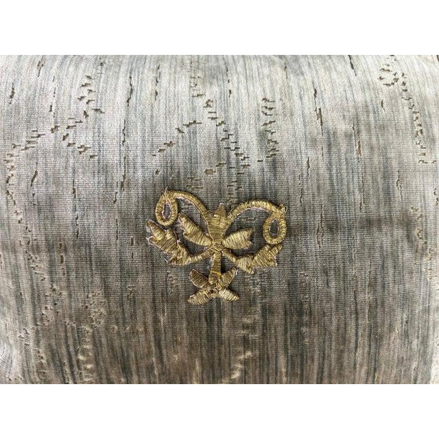 Pair of custom petite embossed silk velvet pillows with 19th century metallic Italian appliques affixed to the fronts. The...