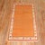 Orange peel colored Midcentury Turkish Anatolian rug.