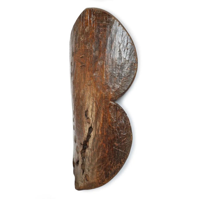 Old Dogon wooden shield from Mali which is a striking example of West African tribal craftsmanship, originally created for...