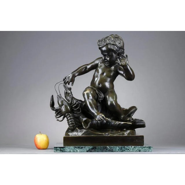 Bronze sculpture with a brown patina shaded in green signed pigalle on the base, representing a child surprised by a...