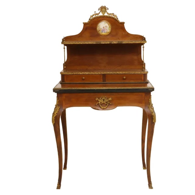 Elegant French Louis XV style lady's writing Desk with a monogramed metal crest over Rococo style plaque, open shelves,...