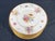 Stunning antique floral plates. Made by Cauldon China. Features a striking floral design. Guaranteed to make any table...