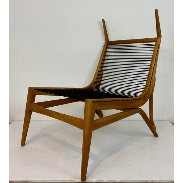 Avant Garde Modern Diablo Teak Lounge Chairs Pair, black chord, showroom floor samples
