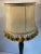 English vintage stretched leather lamp shade with tassels on the rim.