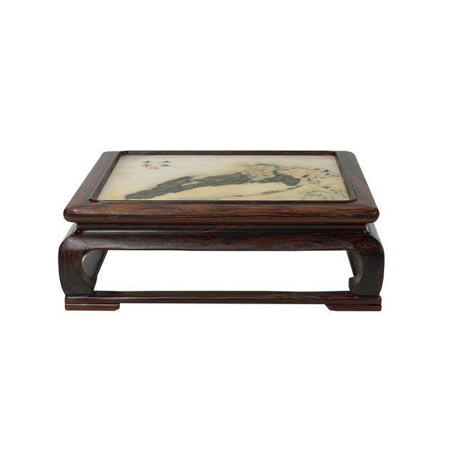 This exquisite low display stand features a rich, dense hardwood frame with a warm grain pattern, elegantly framing a...
