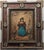 An extraordinary Spanish Colonial devotional retablo featuring an intricately painted depiction believed to represent the...
