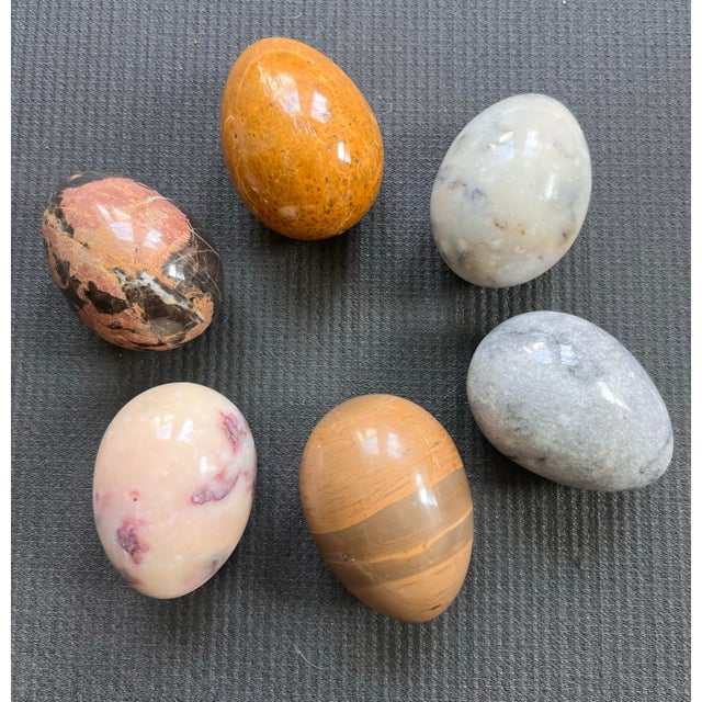 A beautiful set of Italian polished stone eggs featuring a variety of stones: Rhodonite-pink and black Jasper-orange...