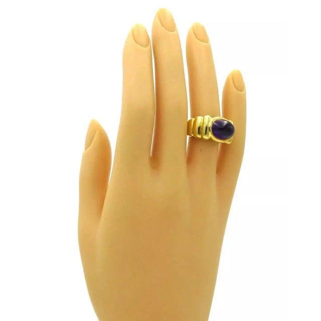 This is a bold and beautiful authentic ring by designer Elizabeth Rand, it is crafted from solid 18k yellow gold in a fine...