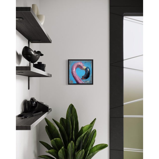 This vibrant oil painting features an inflatable flamingo, rendered in bold pinks and deep blacks, creating a striking...