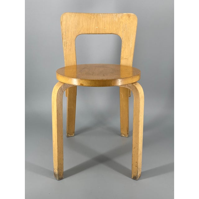 A chair * by Alvar Aalto * Model: Chair 65 * Design from 1935 * Manufacturer: Artek * Back: Birch veneer, clear lacquered...