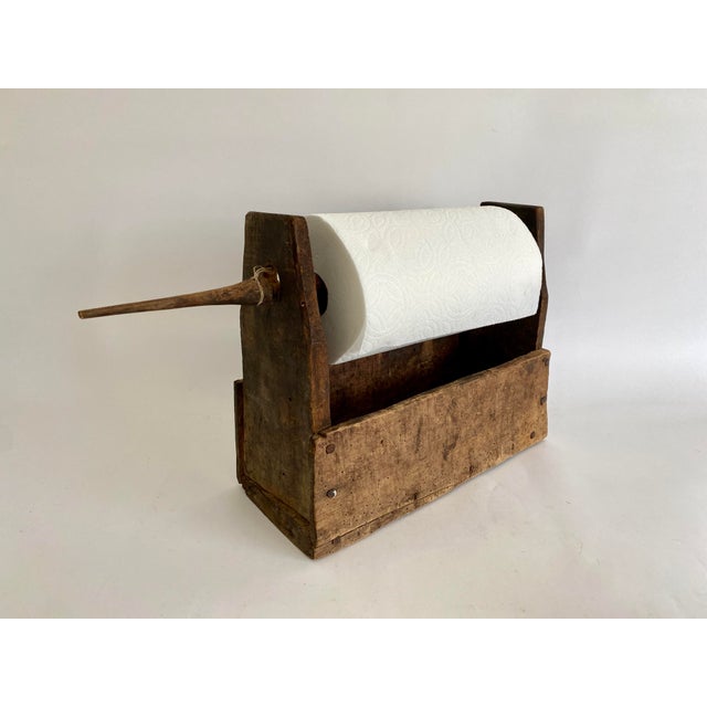Primitive Turkish handmade wood box with spool for spinning wool repurposed as a paper towel holder. One of those unique...