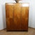 An Art Deco wardrobe with intricate satinwood and ebonised inlay. Figured walnut veneered with macassar ebony base....