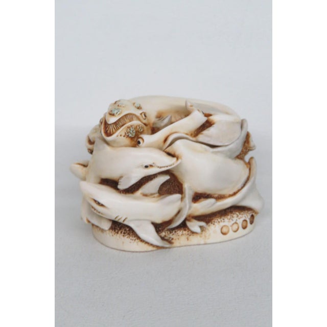 This lovely Box Figurine is made out of crushed marble and polymer resin. This beautiful figurine is carved to resemble an...