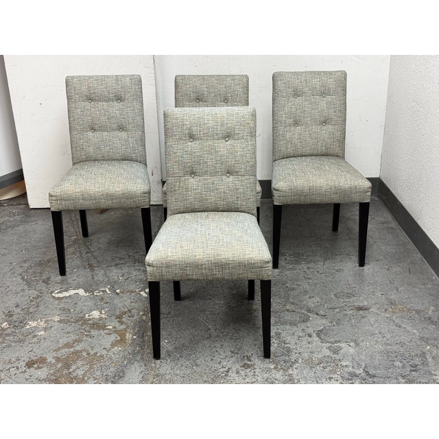 Design Plus Gallery presents a Set of Four Button Tufted Parsons Dining Chairs from Crate & Barrel. Upholstered in a...