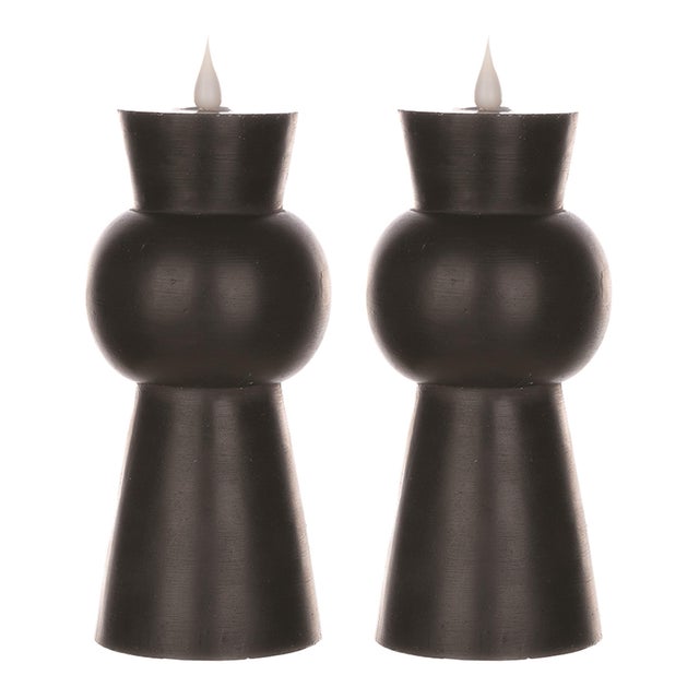 Transform your living space with the elegant Simplux Designer LED Candle Set. Designed with a sleek black finish and a...