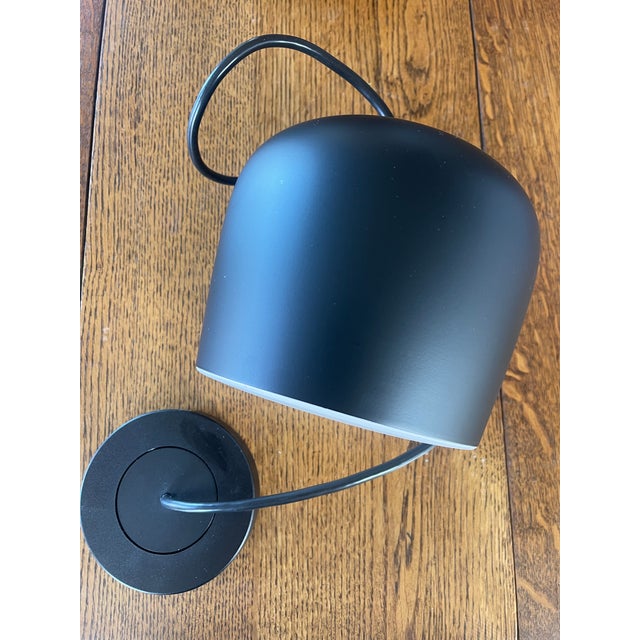 Two iconic Flos Aim pendant lights. These were specified with a single cord to hang above an island in an open kitchen....