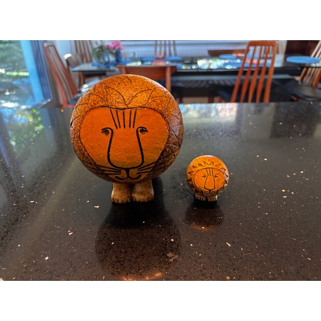 This pair of Lion figurines is part of Lisa Larson's Africa series, featuring playful lions with soft curves and friendly...