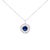 A luminous talisman for everyday radiance, this round medallion glows with a 9 mm lab‑created blue sapphire, heat treated...