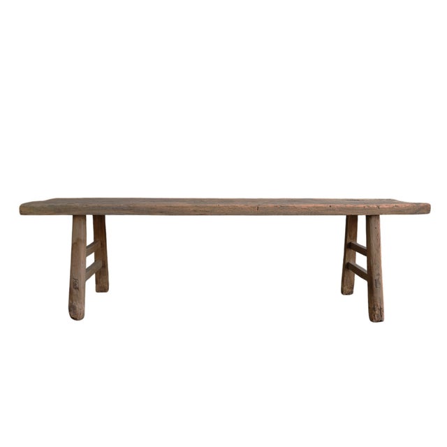 This 72 inch long Shanxi bench is made of solid elm wood. The color and patina of this vintage bench are exactly as it was...