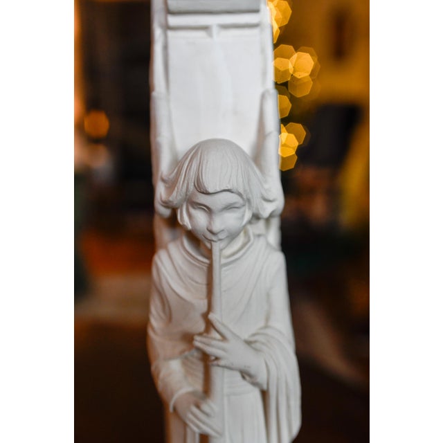 Beautiful Pair of Neoclassical Angels by Facsimilies, LTD. They are designed to resemble medieval-style architectural...