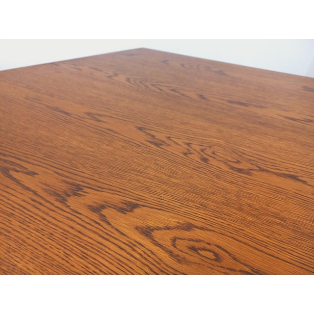 Vintage hexagonal dining table from the 80s, in oak wood, in the style of Maison Regain, central leg with 4 branches, very...