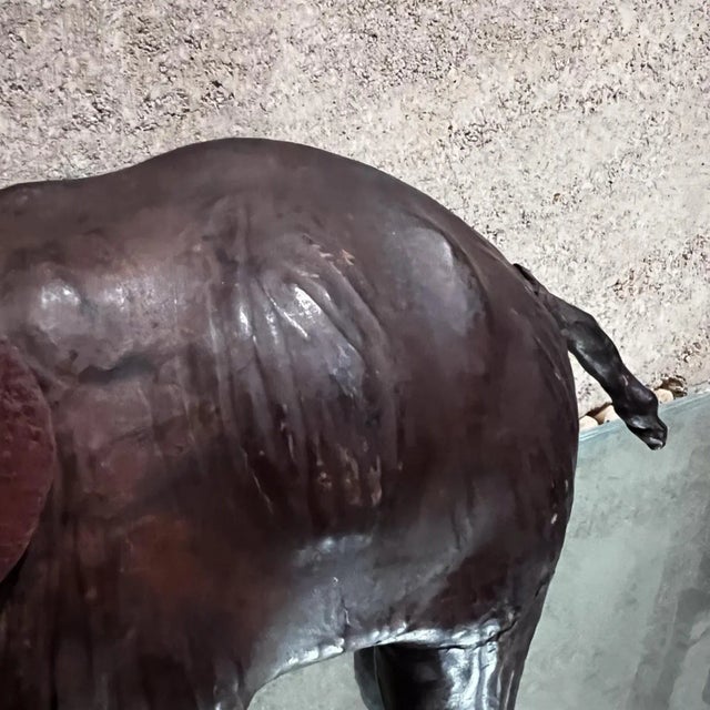 For your consideration, a 1960s Mid-Century modern leather elephant table sculpture.I Wrapped chocolate brown genuine...