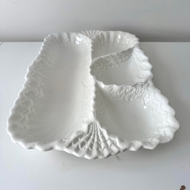 Vintage large Italian majolica oyster platter. Classic, stunning and traditional the piece is in a white with a glaze the...