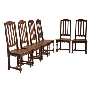 Set of Six Early 20th Century French Chestnut Brown Renaissance Oak Dining Chairs For Sale