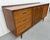 This listing is for a Mid-Century Modern Broyhill Sculptra Walnut 9-Drawer Dresser. Featuring a straight line design,...