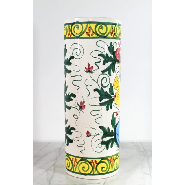 Colorful vintage hand painted ceramic umbrella stand with floral motif. Made in Spain. Some chips on bottom and top edge....