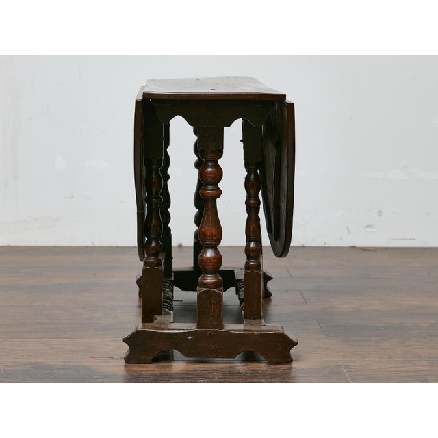Brown Oval Oak Gateleg Table with Turned Legs, England, 19th Century For Sale - Image 8 of 12