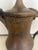 This item is a traditional Middle Eastern Dallah coffee pot, crafted from brass, used for brewing and serving Arabic...