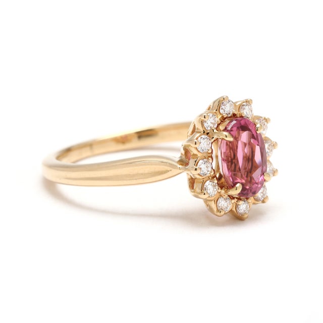 Stones: pink tourmaline, 1 stone oval 6.8 x 4.8 mm approximately .80 carat diamond, 12 stones round brilliant 1.4 mm...
