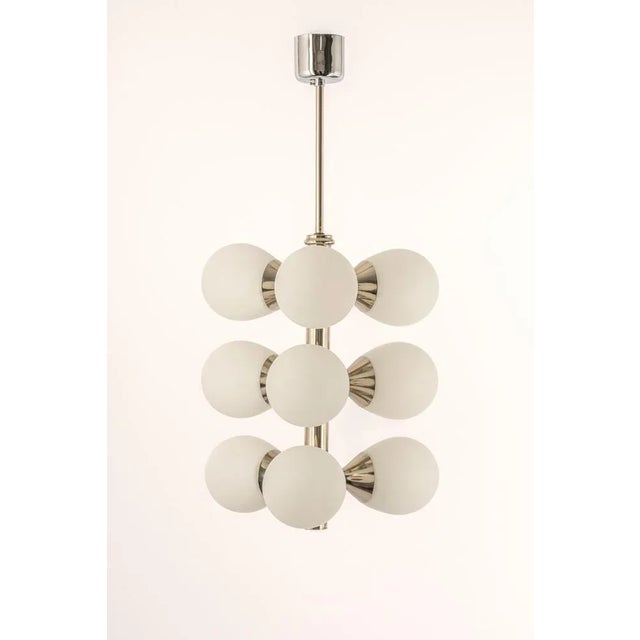 Wonderful sputnik chandelier made by kaiser leuchten, germany, circa 1970-1979. Great atomium-shaped chandelier with 9...
