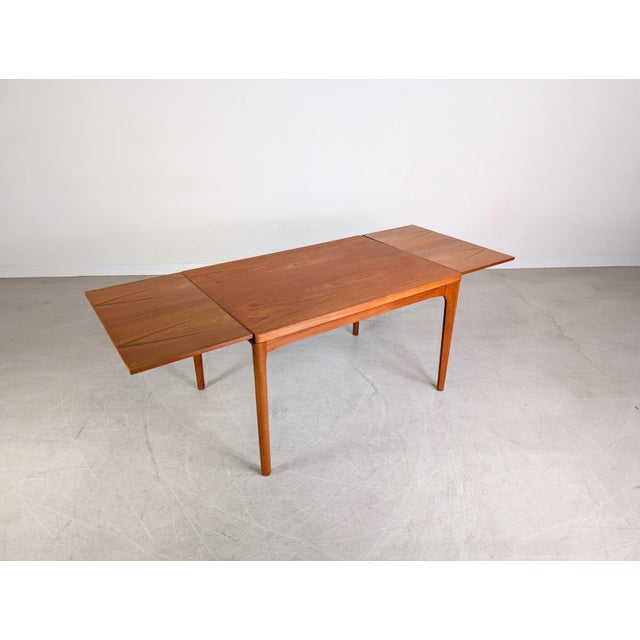 Wood Vintage Extendable Dining Table in Teak by Henning Kjærnulf For Sale - Image 7 of 11