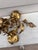 Large metal sconce with flowers and leaves, circa 1960. 34 inches Height.