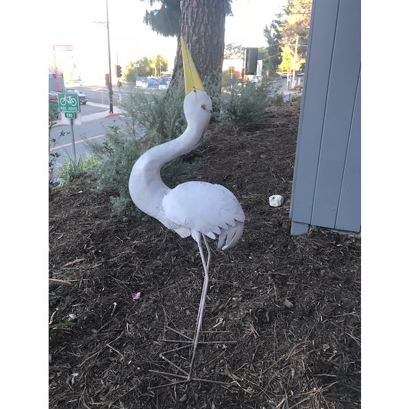 A white heron or coastal egret makes the perfect yard ornament. This iron avian came from an estate sale in Palos Verdes...