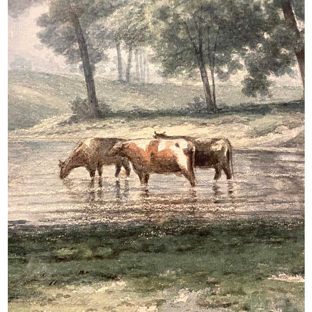 This is a beautiful 19th century Hudson River School painting by J.W. Bell. The painting captures a scene of cattle...