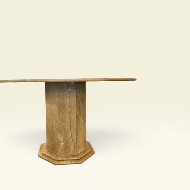 Vintage Italian table with a unique and distinctive octagonal profile. Original from the 1970s, it is in excellent...