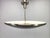 Authentic Bauhaus ceiling light from the 1930s, crafted in Czechoslovakia. This elegant pendant features a wide, dish-...