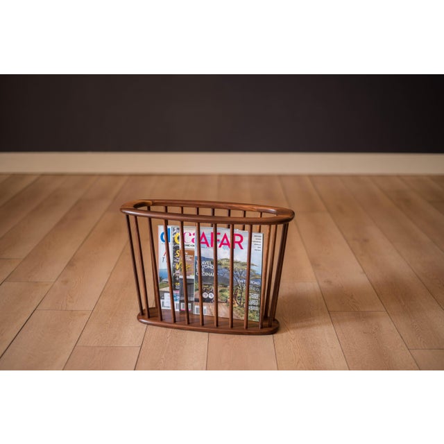 Vintage magazine holder designed by Arthur Umanoff for Washington Woodcraft, circa 1960s. This organizing rack is...