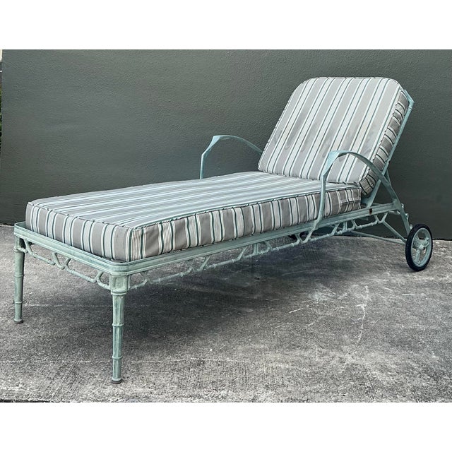This elegant chaise lounge captures the breezy sophistication of mid-century Palm Beach design, epitomizing the high-end...