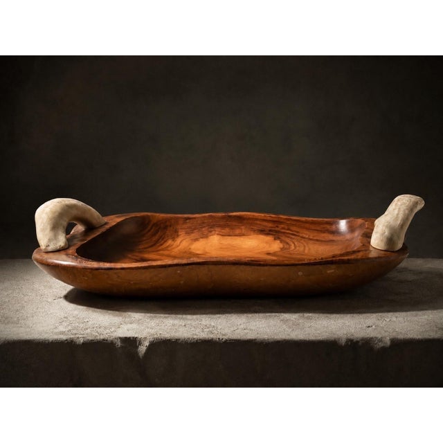 A striking and exceptionally sculptural large handcrafted centerpiece bowl by falcon, spain, showcasing the warmth of...