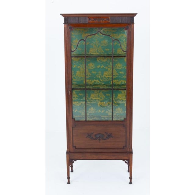 Georgian style mahogany display cabinet Circa 1900 This cabinet is raised upon tapered legs with spade feet and fret work...