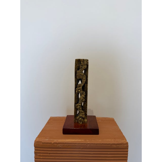 Abstract bronze brutalist sculpture on woods base by renowned Argentinian-Brazilian artist Hugo Rodrigues, 1985. Signed....