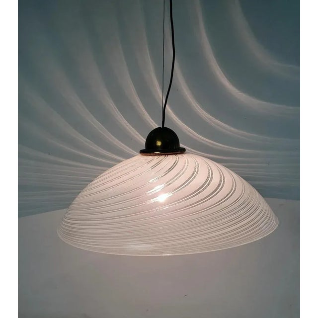 A beautiful large handmade Murano glass ceiling lamp with a swivel design in clear and white. Elegant and striking in it´s...