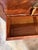 A well-proportioned vintage mahogany chest dating to the early mid 20th century, distinguished by its expressive...