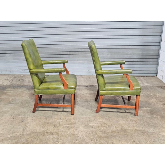 Store Item: PAIR OF Alma MAHOGANY ARMCHAIRS Green LEATHER FABRIC Made In North Carolina Description: Chairs feature a...